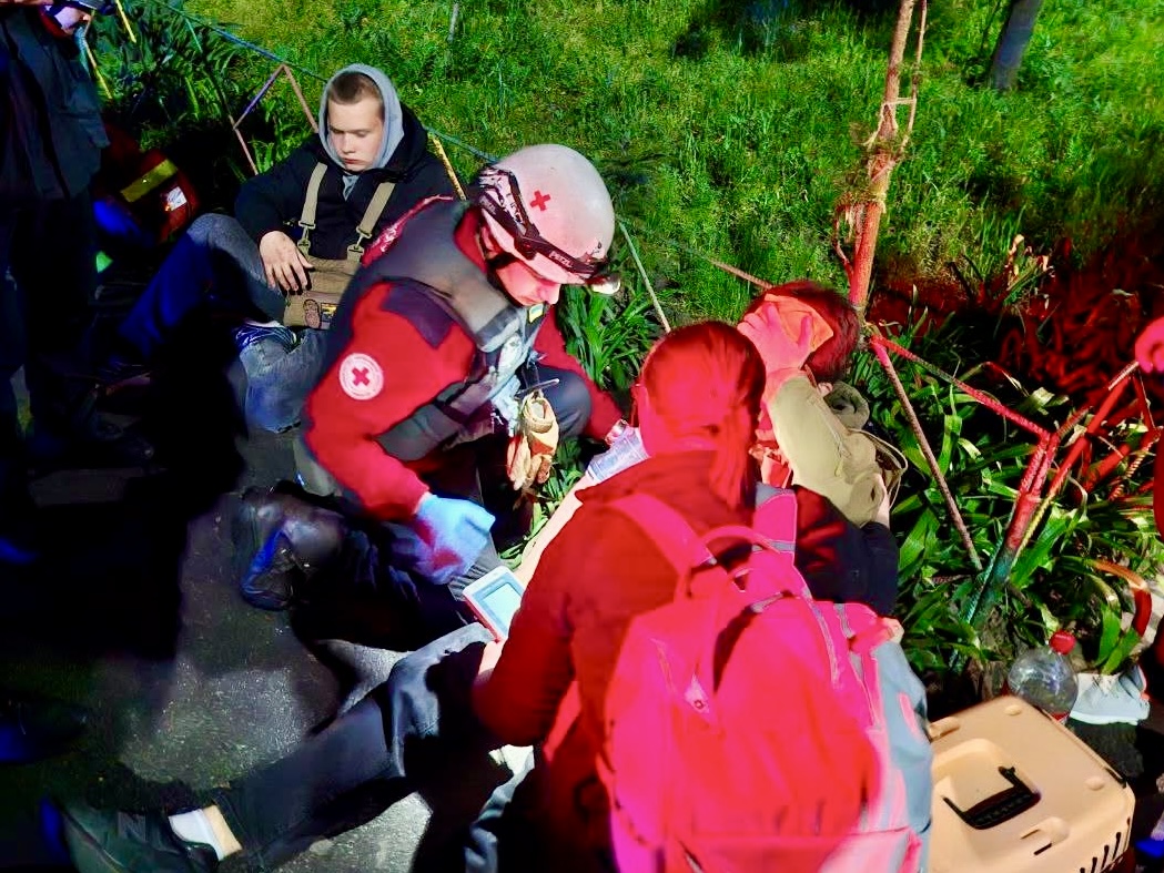 The Ukrainian Red Cross team assists victims of another attack on Kyiv ...