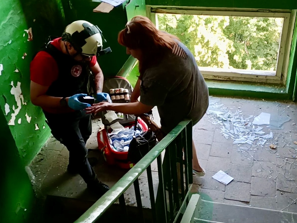 The Ukrainian Red Cross provides assistance at the site of the attack on Kharkiv